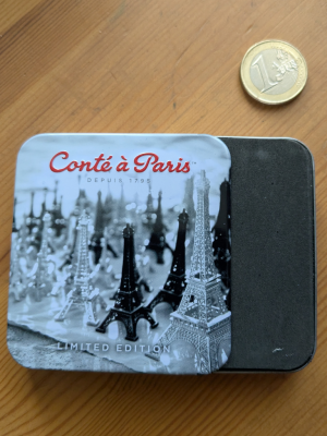Conte_tin_box_slide.png