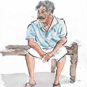On his Charpoy.jpg